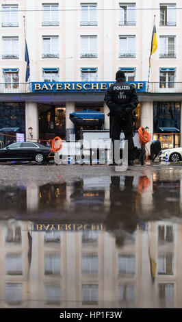 Munich, Germany. 17th Feb, 2017. Police officers outside the Bayerischer Hof hotel which will host the Munich Security Conference in Munich, Germany, 17 February 2017. Photo: Matthias Balk/dpa/Alamy Live News Stock Photo