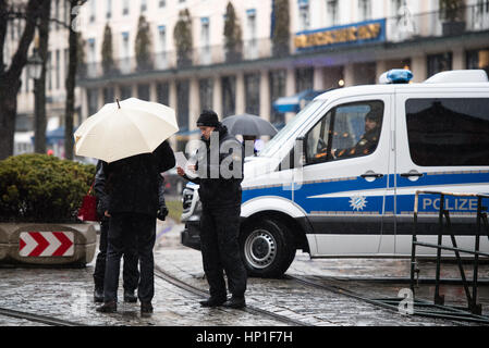 Munich, Germany. 17th Feb, 2017. Police officers outside the Bayerischer Hof hotel hosting the Munich Security Conference in Munich, Germany, 17 February 2017. Photo: Matthias Balk/dpa/Alamy Live News Stock Photo