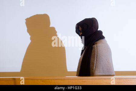 Hanover, Germany. 17th Feb, 2017. Defendant Laura S. arrives in the State Court in Hanover, Germany, 17 February 2017. The 22-year-old defendant faces numerous charges including attempted manslaughter after her boyfriend discovered a suitcase in her flat containing the remains of a dead baby and a recently born, still living infant in late September 2016. Photo: Julian Stratenschulte/dpa/Alamy Live News Stock Photo
