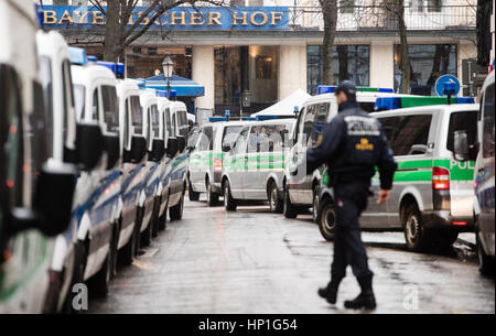 Munich, Germany. 17th Feb, 2017. Police vehicles outside the Bayerischer Hof hotel which will host the Munich Security Conference in Munich, Germany, 17 February 2017. Photo: Matthias Balk/dpa/Alamy Live News Stock Photo