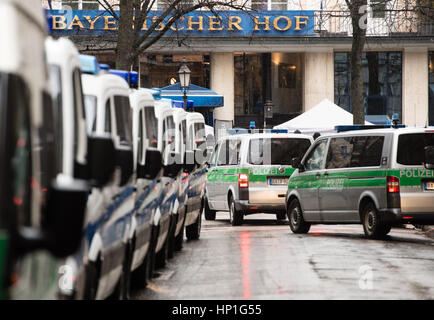 Munich, Germany. 17th Feb, 2017. Police vehicles outside the Bayerischer Hof hotel which will host the Munich Security Conference in Munich, Germany, 17 February 2017. Photo: Matthias Balk/dpa/Alamy Live News Stock Photo