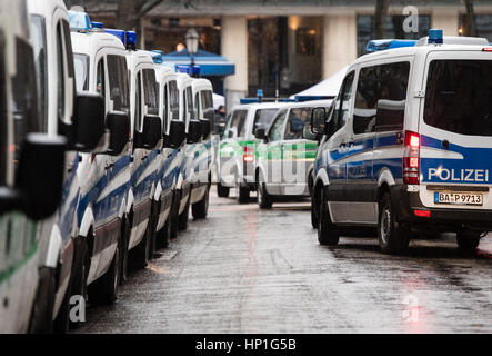 Munich, Germany. 17th Feb, 2017. Police vehicles outside the Bayerischer Hof hotel which will host the Munich Security Conference in Munich, Germany, 17 February 2017. Photo: Matthias Balk/dpa/Alamy Live News Stock Photo