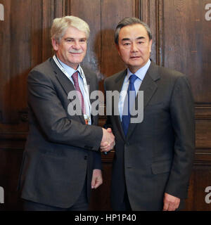 Munich, Germany. 17th Feb, 2017. Chinese Foreign Minister Wang Yi (R) meets with his Spanish counterpart Alfonso Dastis on the sidelines of the 53rd Munich Security Conference in Munich, Germany, Feb. 17, 2017. Credit: Luo Huanhuan/Xinhua/Alamy Live News Stock Photo