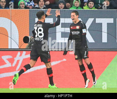 Augsburg, Germany. 17th Feb, 2017. Leverkusen's Javier Hernandez (R) and Karim Bellarabi celebrate during a German Bundesliga match between FC Augsburg and Bayer 04 Leverkusen, in Augsburg, Germany, on Feb. 17, 2017. Augsburg lost 1-3. Credit: Philippe Ruiz/Xinhua/Alamy Live News Stock Photo