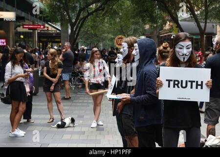 Sydney, Australia. 18 February 2017. ‘A group of Vegans held a silent protest in Pitt Street Mall, wearing anonymous ‘Guy Fawkes’ ‘ masks. Some held placards with the word ‘truth’ whilst others held screens appearing to show animal cruelty. Credit: © Richard Milnes/Alamy Live News