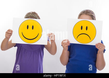 Model release , Trauriges und froehliches Kind, Symbolbild - sad an happy children, symbolic Stock Photo