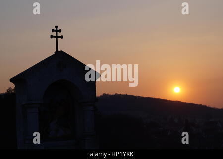 On this picture the sun goes down the hill. Stock Photo