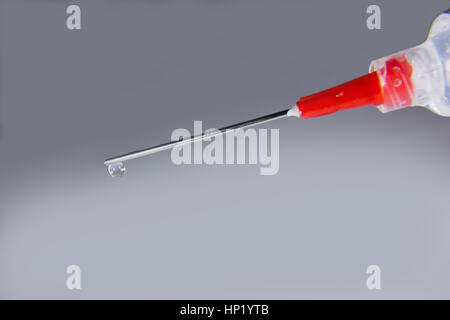 Injection needle closes up Stock Photo