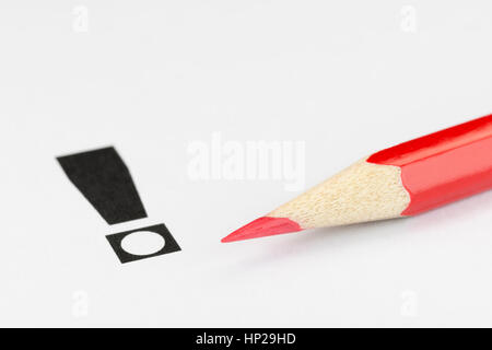 Conceptual visualization of an exclamation point and red pencil as a convinced vote in elections Stock Photo