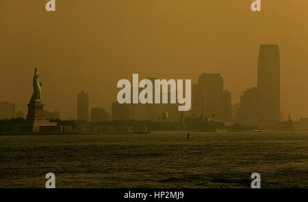 Statue of Liberty and skyline of New Jersey,  New York City, USA
