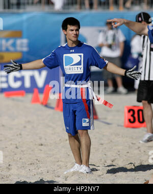Taylor Lautner at the Directv Celebrity Beach Bowl in Miami Beach