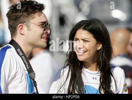 Ed Westwick and Jessica Szohr at the Directv Celebrity Beach Bowl in Miami Beach, Florida on February 6, 2010. Francis Specker Stock Photo