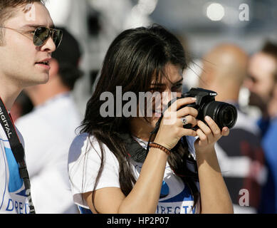 Ed Westwick and Jessica Szohr at the Directv Celebrity Beach Bowl in Miami Beach, Florida on February 6, 2010. Francis Specker Stock Photo