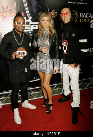 apl.de.ap, Stacy Ferguson, aka Fergie, and Taboo of the Black Eyed Peas arrive at the Sports Illustrated B4XLV Party at Super Bowl XLV on February 4, 2011 in Dallas, Texas. Photo by Francis Specker Stock Photo