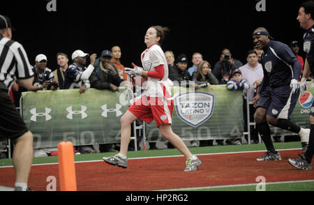 Sarah Ramos catches a touch down pass at the Tazon Latino V flag football game at Super Bowl NFL Experience at the Dallas Convention Center on February 2, 2011 in Dallas, Texas. Photo by Francis Specker Stock Photo