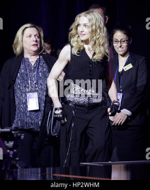 Singer Madonna  arrives at a press conference for the Super Bowl XLVI half time show in Indianapolis, Indiana on February 2, 2012. Photo by Francis Specker Stock Photo