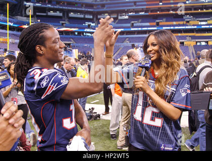 Singer Ciara, right, high fives New England Patriot player Sergio Brown at the Super Bowl XLVI Media Day in Indianapolis, Indiana on January 31, 2012. Francis Specker Stock Photo