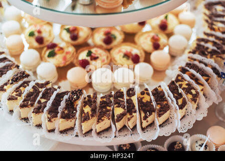 Banquet table full of fruits and berries an assortment Stock Photo