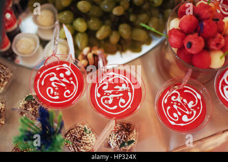 Banquet table full of fruits and berries an assortment Stock Photo