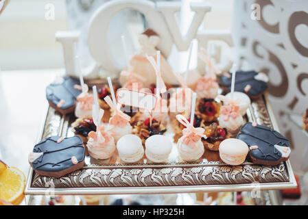 Banquet table full of fruits and berries an assortment Stock Photo