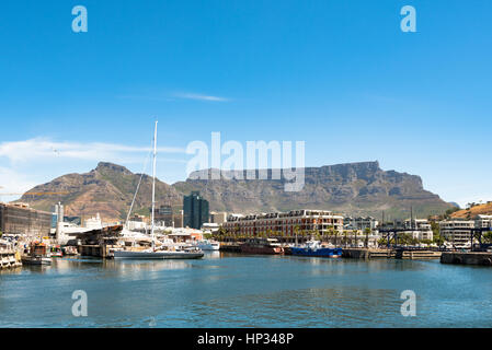 Cape Town, South Africa - December 1, 2016: The famous V&A Waterfront of Cape Town with the Table Mountain in the background. Stock Photo