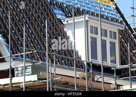 roofing work at new build single-family house Stock Photo