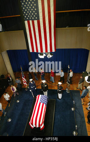 The public lines up the view the casket of President Ronald Reagan at the Reagan Library in Simi Valley, California on June 8, 2004.  Photo credit: Francis Specker Stock Photo