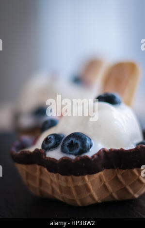 waffle baskets with vanilla ice cream and berries blueberry Stock Photo ...