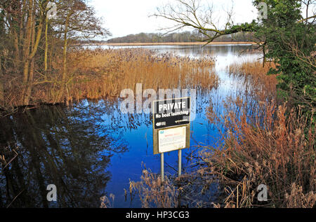 A notice prohibiting the launching of boats into Ormesby Little Broads on the Norfolk Broads at Filby, Norfolk, England, United Kingdom. Stock Photo