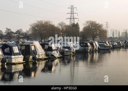 Cruisers and Canal Boats Moored at Sawley Marina on February Morning Stock Photo