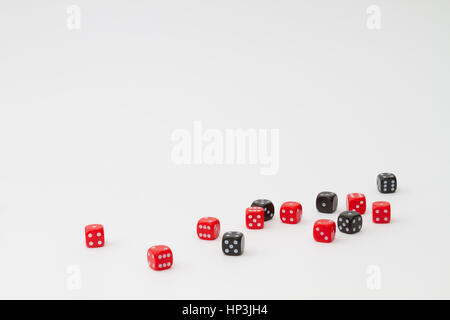 Random set of 13 red and black dices on white isolated background Stock Photo