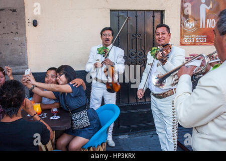 Mariachis playing music, Plaza Garibaldi, square, Mexico City, Mexico Stock Photo