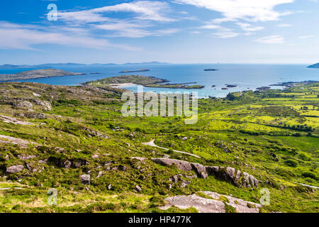 Panoramic views over Kenmare River, Abbey Island, Deenish Island and Scariff Island from Com an Chiste Pass, Ring of Kerry, Iveragh peninsula, County  Stock Photo