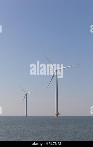 Windturbines in the water producing alternative energy Stock Photo