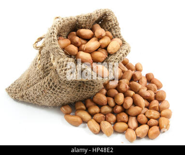 Peanuts soybean in canvas sack on white background Stock Photo