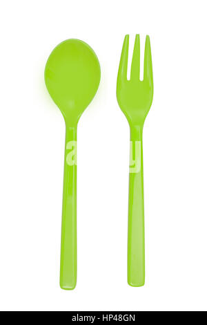 Green plastic  fork and spoon isolated on white Stock Photo