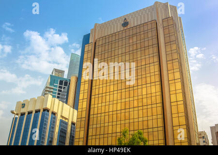 Abu Dhabi, United Arab Emirates - April 22, 2013: The headquarters of Arab Monetary Fund reflected in the blue sky. Finance and business concept.Skysc Stock Photo