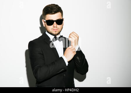 Handsome man wearing smoking Stock Photo