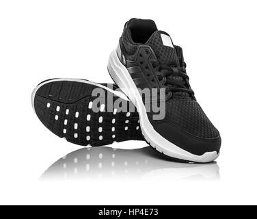 Black unbranded sneakers. Stock Photo