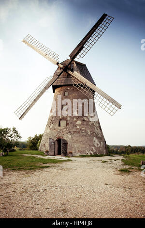 Traditional Old dutch windmill in Latvia. Araisi win mill in Vidzeme. Stock Photo