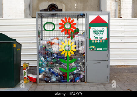 recycling bin for plastic bottles at sidewalk, tel aviv, israel Stock Photo