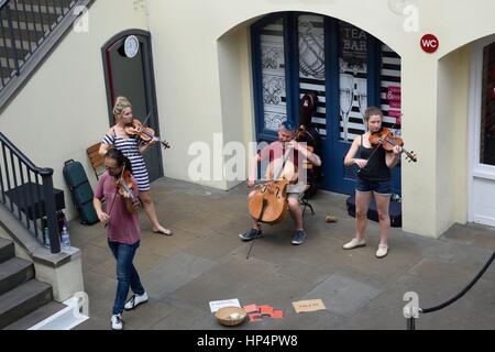 Covent Garden London England, United Kingdom - August 16, 2016: String Quartet playing  in convent garden central piazza Stock Photo