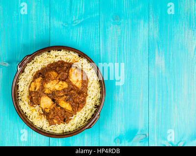 Chicken Balti Curry and Pilau Rice Indian Style Food Stock Photo