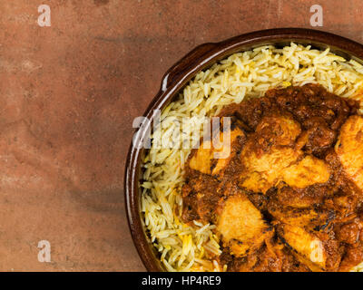 Chicken Balti Curry and Pilau Rice Indian Style Food Stock Photo