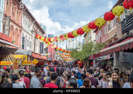 Crowd in a street of Chinatown during chinese new year in Singapore Stock Photo