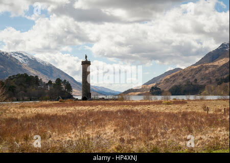The Glenfinnan monument with Loch Shiel beyond. It was erected, in 1815, in tribute to the Jacobite clansmen who fought and died in the cause of Princ Stock Photo