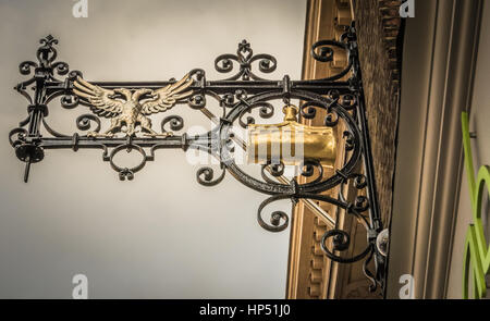 The 'Sign of the Golden Bottle' outside C. Hoare & Co. Britain's oldest private deposit bank. Stock Photo