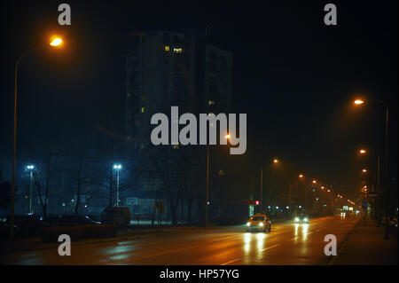 Cacak town in Serbia, winter season, small Balkan city outdoors during night. Stock Photo