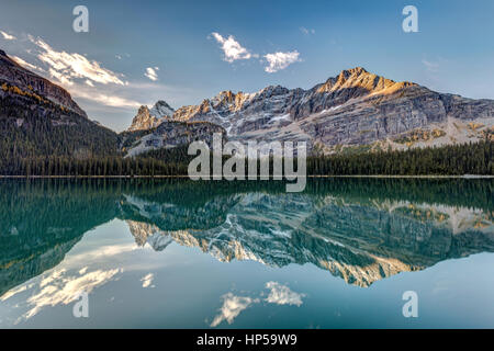 Calm and quiet morning in the wilderness of the stunning Lake Ohara in the heart of the Canadian Rockies, Yoho National Park, British Columbia. Stock Photo