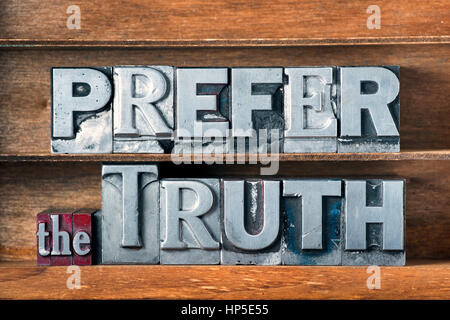 prefer the truth phrase made from metallic letterpress type on wooden tray Stock Photo